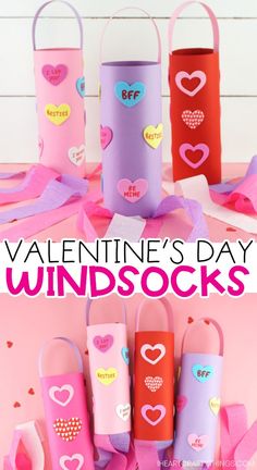 valentine's day wind socks made out of toilet paper and some hearts on them