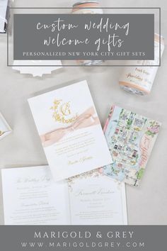 the wedding stationery suite is laid out on top of a table with other items