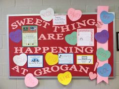 a bulletin board that says sweet things are happening at organ like lollipops