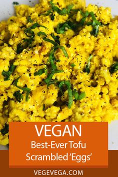 a white plate topped with scrambled eggs covered in green leafy garnish and text vegan best - ever tofu scrambled eggs