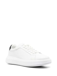 Calvin Klein low-top Leather Sneakers | White | FARFETCH Classic Lace-up Platform Sneakers With Embossed Logo, White Leather Platform Sneakers With Logo-print Tongue, Calvin Klein White Sporty Sneakers, White Low-top Sneakers With Contrast Sole, Low-top Sneakers With White Contrast Sole, Casual Calvin Klein Sneakers With Rubber Sole, Sporty Platform Sneakers With Logo-print Tongue, Calvin Klein White Sole Synthetic Sneakers, Calvin Klein White Synthetic Sneakers