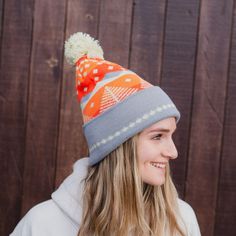 ALL SALES FINAL This Winter Sunset Pom Beanie is sure to warm your head and soul! Combining the cozy comfort of a beanie with a vivid, winter sunset design, it's the perfect way to brighten up the coldest of days. Embrace the cooler weather in style! A Montana Scene Original Design. All designs are property of The Montana Scene. All rights reserved.All of The Montana Scene apparel is designed and printed locally in Montana. Come visit our storefront locations! Bigfork * Whitefish * Missoula * Ka Orange Beanie For Winter, Winter Orange Hat, One Size Fits Most, Winter Orange Adjustable Hat, Winter Orange Hat, One Size Orange Winter Hat, Orange Winter Hat, Sunset Design, Winter Sunset, Cooler Weather