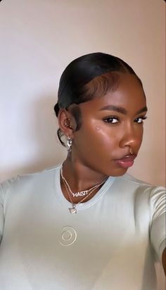 Sleek Middle Part Bun Black Women, Black Woman Slick Back Hair, Lori Harvey Slick Back Bun, Mid Bun Black Women, Low Knot Bun Middle Part, 4c Sleek Bun, Slickback Bun Black Women