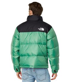 The classic 1996 Nuptse Jacket keeps you comfortable through any adventure. With DWR coating to shed light rain and quick-drying goose down insulation, you stay warm and dry. Features include an adjustable hood that packs away, adjustable cuffs, secure zip pockets and color-blocked design. At under 100 words, this cozy classic is a must-have for your feed. Green Down Puffer Jacket For Outdoor Activities, Green Down Puffer Jacket For Streetwear, North Face 1996 Nuptse, 1996 Nuptse Jacket, The North Face 1996 Retro Nuptse, North Face Jacket Mens, 1996 Retro Nuptse Jacket, The North Face 1996, North Face 1996