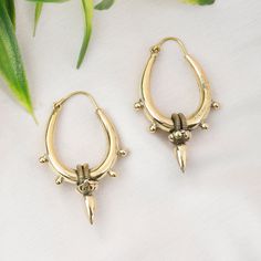 Drop-Shaped Gold or Silver Brass Hoop Earrings. These Creoles are Thick but Light, Elegantly Decorated with Point Patterns on the Perimeter, Chain Patterns in the Center, ending with a Point. To Give an Ethnic Touch to Your Outfits. They are made from brass. Wear it everyday or whatever the occasion. Indispensable for Boosting an Allure, they Catch the Eye, Reflect the Light and Highlight the Face. Material: Brass Color: Gold or Silver Length: 4.5 cm Width: 2.5 cm Thickness: from 0.3 cm to 0.5 c Brass Hoop Earrings, Brass Hoops, Jewelry Earrings Hoops, Brass Color, The Face, Etsy Earrings, Etsy Accessories, Jewelry Earrings, Hoop Earrings