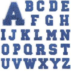 the upper and lower letters are made out of blue felt, which has been cut in half