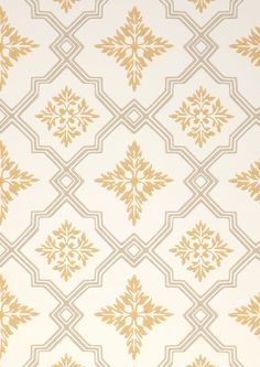 a white and gold wallpaper with an intricate design