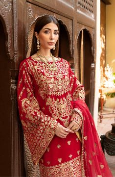 Elegant Red Salwar Kameez by Pakistani Designer is an outstanding attire with breathtaking artistry on it. This apparel with fine embroidered patterns on it appears to be a very decent choice for any special event if you are looking for Pakistani Party Dresses. Kameez: A meticulously designed beautiful kameez is paired with this magnificent Pakistani Dress. This kameez has beautiful embroidery accompanied by tilla and iridescent sequins on the front, back, and sleeves. stunningly embellished vel Red Salwar Kameez, Latest Pakistani Dresses, Party Wears, Red Bridal Dress, Pakistani Formal Dresses, Pakistani Dresses Online, Best Designer Dresses, Bridal Dresses Pakistan, Embroidered Velvet