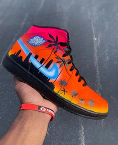 These are my custom  Sunset Jordan's. my customs are all special in every way and no pair will be the same. All customs are made to order, and hand painted. If you want something done that you don't currently see in my shop shoot me a message and let's make it happen! custom sunset shoe I custom sunset sneaker | air jordan customs | tropical custom | nike air force 1 | sunset sneakers | Jordan sneakers | Coopskicks | flower custom | coops kicks | sunset Jordan's | birthday gifts | summmer style | custom paint shoe Miami Palm Trees, Jordan 1 Green, Air Jordan 1 Blue, Jordan 1 Mids, Custom Air Jordan 1, Miami Sunset, Custom Air Jordan, Basketball Stuff, Painted Nikes