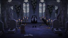 a gothic - themed room with candles and statues