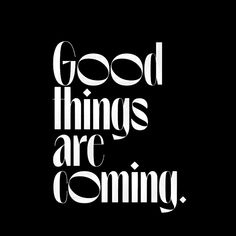 the words good things are coming written in black and white on a black background,