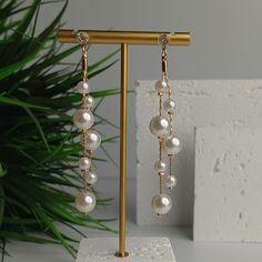 Pearl Drop Dangle Bridal Earrings For Party, Pearl White Dangle Bridal Earrings, White Dangle Bridal Earrings With Pearl Chain, Party Pearl Chain Dangle Bridal Earrings, Wedding Linear Drop Earrings With Pearl Chain, Gold Long Drop Chandelier Earrings For Wedding, Pearl Chain Linear Drop Earrings For Wedding, White Long Drop Chandelier Earrings For Wedding, Evening Pearl Dangle Bridal Earrings