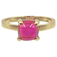 Designed by Paloma Picasso for Tiffany & Co. from the Sugar Stack collection in 18 karat yellow gold and pink tourmaline. This is the small-size version featuring a sugarloaf cabochon-cut natural pink tourmaline measuring 7.15 x 7.45mm and weighing approximately 2.25 carats. Finger size 7 1/2. Signed 'Tiffany & Co. 750' '© Paloma Picasso'. Tiffany Love Ring Paloma, Fine Jewelry Pink Enamel Ring, Tiffany And Co Paloma Picasso Rings, Tiffany Diamond Ring, Luxury Pink Tourmaline Rings, Fine Jewelry Tourmaline In Pink, Paloma Picasso, Diamond Heart Ring, Stack Ring