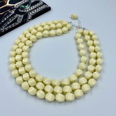 A statement piece exuding timeless elegance, this necklace features chunky beads in a creamy vanilla white hue. The beads' substantial size offers a bold presence, while their neutral tone ensures versatility and class. Perfect for those who appreciate understated luxury, this necklace complements a myriad of outfits, lending a sophisticated touch to both daywear and evening ensembles. - Necklace length is 16.5" shortest strand plus additional 3 inch extender chain for length adjustment. Matchin White Chunky Necklace, Light Weight Necklace, Short Layer, Long Layer, Friends Necklace, Autumn Necklace, Christmas Necklace, Gold Bead Necklace, Chunky Beads