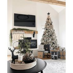 a living room with a christmas tree and presents