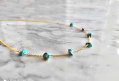 Galapagos. Inspired by the exotic landscapes and tropical essence of Galapagos islands! This necklace is composed of 14K gold vermeil delicate chain and raw turquoise gemstones in aqua blue shades. So delicately pretty for everyday! It also makes a very cute gift! Available in: ❉ 14K Yellow Gold vermeil ❉ 14K Rose Gold vermeil ❉ 925 Sterling Silver You can choose between 4 chain lengths: 14 / 15 / 16 / 18 inches Not sure which length to buy? We can add a 1 inch extender chain. Just write a note Dainty Yellow Gold Turquoise Necklace For Gift, Dainty Gold Necklace With Raw Stone, Gold Turquoise Gemstone Necklace In Dainty Style, Dainty Gold Turquoise Gemstone Necklace, Handmade Dainty Gold Turquoise Necklace, Dainty Handmade Gold Turquoise Necklace, Dainty Turquoise Necklace With Delicate Chain, Dainty Turquoise Necklace With Adjustable Chain, Minimalist Turquoise Gemstone Necklace