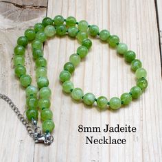 Elevate your style with our Jadeite Necklace, a captivating statement piece designed for women who appreciate the natural beauty of jadeite gemstones. This unique necklace features a 8mm light green jadeite beads, meticulously handcrafted to create a bold and elegant accessory. At ArtMasteryShop, we prioritize quality craftsmanship. We meticulously select materials that reflect our commitment to excellence. The necklace is adorned with light green jadeite beads and knots between the beads, adding sophistication and ensuring durability for daily wear. Our Jadeite Necklace is a celebration of the soothing green hues of jadeite, making it a stylish and meaningful addition to your jewelry collection. Whether worn as a standalone statement piece or paired with other jewelry, it adds a touch of Green Gemstone Necklace For Birthday, Green Necklace For May Birthstone Birthday, Green Necklaces With 8mm Beads For Gifts, Green 8mm Beads Necklace For Gift, Green Jade Necklaces With Faceted Beads, Green Faceted Jade Beaded Necklace, Spiritual Hand-strung Jade Beaded Necklace, Hand-strung Green Jade Beads, Jade Gemstone Beads, Round Shape