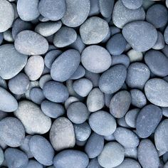 some rocks are laying on top of each other