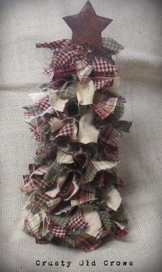 a christmas tree made out of old cloth