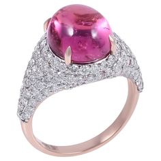 Introducing our stunning Pink Tourmaline Ring – a true beauty that'll make you swoon! This gorgeous ring features a dazzling 6.55 carat pink tourmaline stone that's sure to steal the spotlight. Its Gross Weight is 5.36 grams. The sides of the band are adorned with shimmering diamonds of 1.66 carats, adding that extra touch of sparkle and glamour. It's like having a little party on your finger every time you wear it! Crafted with care and precision, this ring is made to last, so you can rock it w Steal The Spotlight, Pink Tourmaline Ring, Gorgeous Ring, Tourmaline Stone, Tourmaline Ring, On The Side, Pink Tourmaline, True Beauty, Solitaire Ring