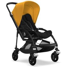 the buggy stroller is shown in yellow and grey with wheels on each side