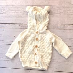 Baby Cream/White Sweater White Warm Winter Cardigan, Warm White Winter Cardigan, Warm White Long Sleeve Cardigan, Cozy Warm White Cardigan, Playful White Sweater For Fall, Cozy White Cotton Outerwear, Cozy White Cotton Sweater, White Warm Knit Sweater, Warm White Knit Sweater