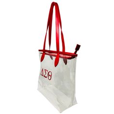 Comply with those events on campus or arenas that require clear accessories. Clear Tote Material with Red Accents DST Printed Greek Letters in Red Top Zip Opening, 10" Strap Drop Bag Size: 12" L, 12" H, 5" Red Rectangular Bag With Clear Strap, Red Bags With Clear Strap For Everyday Use, Clear Accessories, Clear Tote Bags, Greek Letters, Red Accents, Red Top, Green Tops, Size 12