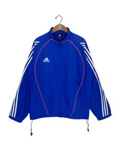 Sku 0186 *BUY 2PCS ABOVE CAN GET BEST OFFER *OFFER ARE WELCOME! Rare‼️ Vintage Adidas Track Top Jacket Stripe * Tag Adidas  * Size M MEASUREMENT : IN CM CHEST:  Measure straight across from armpit to armpit = 62' LENGTH: from base of collar/neck to bottom hem = 72' SHOULDERS: straight across highest point of shoulders = 56' SLEEVE LENGTH: Measure from top of the shoulder seam to bottom edge of sleeve = 61' HEM: Measure straight across bottom hem = 58' Condition : 9/10 Minor defect at the waist rope *refer pictures for more details  PLEASE ASK ANY QUESTION BEFORE BUYING  Item is used and vintage, dont expect it to be like new SHIPMENT: WE ARE USING DHL AS OUR COURIER  PARTNER. THE SERVICE COME WITH  TRACKING NUMBER THAT ALLOWED TO  CHECK ANYTIME. 1. USUALLY THE EXPRESS SERVICE WILL TAKE 3-7 Adidas Track Top, Vintage Givenchy, Adidas Sweater, Adidas Vintage, Adidas Track, Collar Neck, Adidas Tops, Vintage Adidas, Sweaters Knitwear