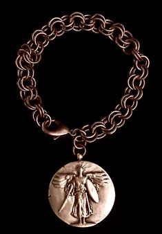 Saint Michael Victory Medal cable link chain bracelet by Whispering Goddess medallion is recast from the American Forces WW2 Victory Medallion. The back of the medallion depicts the great alliance of the Allied Forces who came together to for World Peace. Saint Michael is said to have been seen and acted as a beneficial force on the battle lines. Invite him into your life with this beautiful reminder so he can do the same for you. Saint Michael is known and respected in many of the World Religio Jewelry Design Studio, Healing Gemstones, Angelic Realm, Goddess Jewelry, Saint Michael, Link Chain Bracelet, Signature Jewelry, World Peace, St Michael