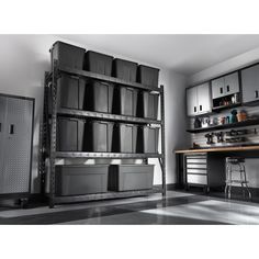 a large metal shelf filled with lots of storage bins next to a kitchen counter