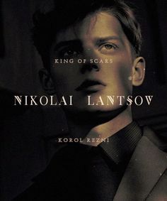 a man wearing a suit and tie with the words nikola lantsov on it