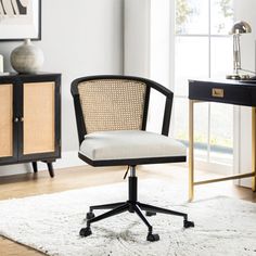 an office chair sitting on top of a white rug