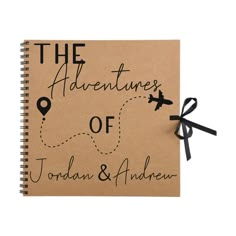 the adventures of jordan and andrew notebook with black ribbon tied around it's cover