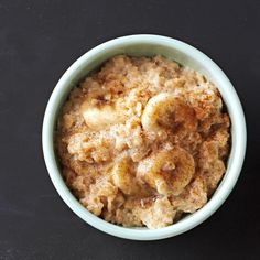 a bowl of oatmeal is sitting on a chalkboard