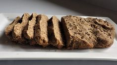 slices of brown bread on a white plate