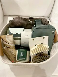 a white basket filled with personal care items