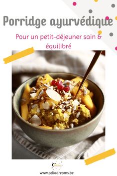 a bowl filled with fruit and nuts on top of a table