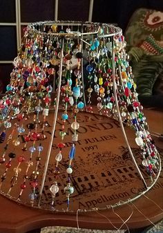 a chandelier with many different colored beads on it