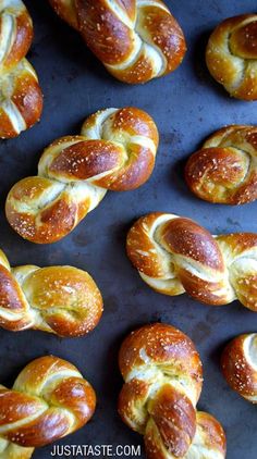 freshly baked breads on a baking sheet ready to be cooked in the oven or used as an appetizer