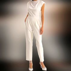 $139 Calvin Klein Women's Gorgeous Ivory/Off White Jumpsuit With Btton Shoulder Decor. Size: Medium ( Tag Says 10, Runs Small 6-8) Measurement: Pit To Pit 19" Length 54" Waist 16.5" New, With Tag. Chic Daywear Jumpsuits And Rompers, White Sleeveless Jumpsuit For Formal Occasions, Elegant White Sleeveless Pantsuit, White Sleeveless Jumpsuits And Rompers For Formal, White Sleeveless Jumpsuits And Rompers For Formal Occasions, Fitted Calvin Klein Jumpsuits And Rompers For Party, Chic Sleeveless Jumpsuits And Rompers For Day, Sleeveless Jumpsuits And Rompers For Daywear, Elegant Summer Overalls Bottoms