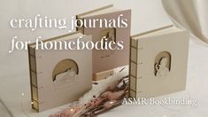 an open book with the words crafting journals for homebodies