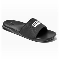 A casual lifestyle is calling your name, and these men's Reef One slide sandals are a quick and simple way to aid your oceanic adventure.Click this FOOTWEAR GUIDE to find the perfect fit and more! A casual lifestyle is calling your name, and these men's Reef One slide sandals are a quick and simple way to aid your oceanic adventure.Click this FOOTWEAR GUIDE to find the perfect fit and more! SANDAL FEATURES Water friendly synthetic straps Super soft padded jersey lining Non-marking outsoleSANDAL Comfortable Slip-on Sandals For Water Sports, Synthetic Open Toe Sport Sandals For Surfing, Casual Slip-on Sport Sandals For Water Sports, Open Toe Synthetic Sport Sandals For Surfing, Slip-on Sport Sandals For Summer Water Sports, Summer Slip-on Sport Sandals For Water Sports, Casual Slide Sandals For Water Sports, Sporty Open Toe Slides For Water Sports, Casual Non-slip Slides For Water Sports