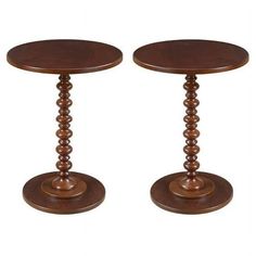 two small wooden tables sitting next to each other