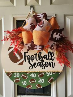 a football season door hanger hanging on the front door