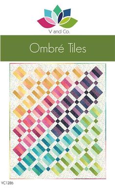 an image of a colorful quilt with the words ombre tils on it in green and