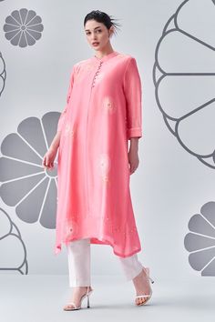 Gelato chanderi silk tunic with scattered contrast floral embroidery and felt accents. Comes along with an inner and pant. - Aza Fashions Silk Resham Embroidery Tunic Kurta, Silk Resham Embroidery Kurta Tunic, Silk Tunic Kurta With Resham Embroidery, Silk Kurta With Resham Embroidery Tunic, Silk Tunic With Resham Embroidery For Designer Wear, Spring Designer Silk Salwar Kameez, Festive Silk Tunic With Floral Embroidery, Spring Silk Kurta With Zari Work, Silk Kurta Tunic With Printed Motifs