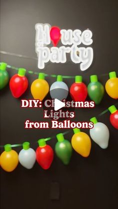 christmas lights are hanging from balloons on the wall in front of a house party sign