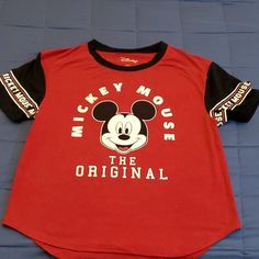 Mickey Mouse, The Original- Logo T-Shirt. Fabrication Tag Attached. Love The Sleeves With Logo Print. Great Fun Tee To Have! Never Worn. Red Character Print Short Sleeve Tops, Red Character Print Top, Red Short Sleeve Tops With Character Print, Disney Fan Merchandise Short Sleeve Tops, Disney Short Sleeve Tops For Fan Merchandise, Minnie Mouse Crew Neck Top For Disney Events, Pop Culture Red T-shirt With Logo Print, Red Pop Culture T-shirt With Logo Print, Red Cotton Pop Culture Tops