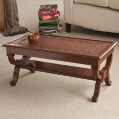 a coffee table with some books on it