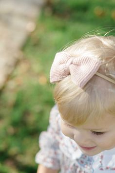 Introducing our Chic Knit Tuxedo Bow Headband for Babies: the perfect accessory to add a touch of charm to your little one's outfits. This knitted tuxedo bow, hand-sewn onto a soft headband in a light brown shade, ensures both comfort and style for your baby. - 100% cotton - Hair Bow: 4 inches (10 cm) W x 2 inches (5 cm) L - Available in 7 different colors This chic bow seamlessly combines with Mi Lucero brand knits, offering a coordinated and elegant look. Perfect for all ages, it’s an essential addition to your accessory collection. Pictures by Brooke Blane Crown Party, Soft Headbands, Velvet Hair, White Headband, Small Baby, Red Blue Green, Bow Holder, Crown Headband, Velvet Bow